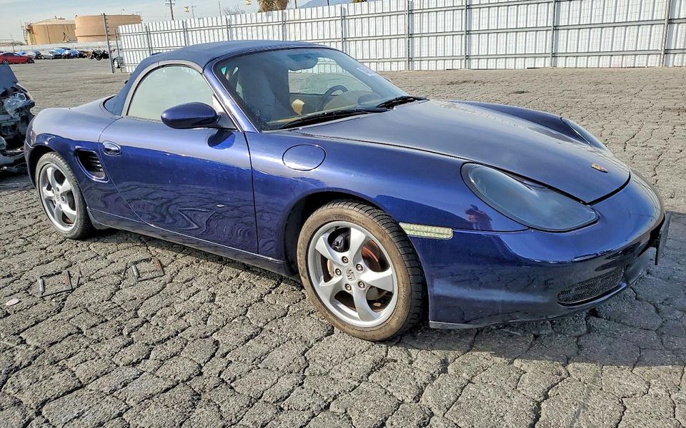 2001 Porsche Boxster in blue, front three-quarter view